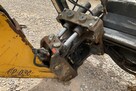 Ładowarka o sterowaniu burtowym Komatsu SK07J z 2001 roku - 10