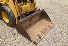 Ładowarka o sterowaniu burtowym Komatsu SK07J z 2001 roku - 8