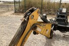 Ładowarka o sterowaniu burtowym Komatsu SK07J z 2001 roku - 6