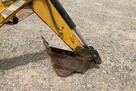 Ładowarka o sterowaniu burtowym Komatsu SK07J z 2001 roku - 5