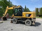 Koparka kołowa CATERPILLAR M316D rok 2010 - 1