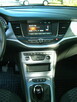 Opel Astra 1,4T 125 KM Enjoy S&S Salon PL 2020 1 rejestracja - 11