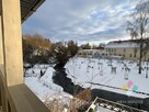 Budynek usługowy z widokiem na rzekę i park - 12