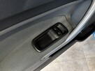Ford Fiesta 1.2 82KM M5 2010 r., klimatyzacja, przyciemniane szyby, radio CD - 12