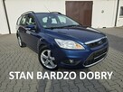 Ford Focus 1,8Benz Serwis.Klima.Podg.Fot.GHIA.Hak.Alufelgi - 1