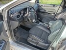 Ford Focus 1.6 TDCI Ghia, 2009 r, Diesel, 109 KM, 235 245 km - 11
