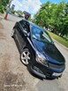 Opel Astra H GTC 1.9 CDTI 2005 r. - 3