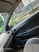 Opel Astra H GTC 1.9 CDTI 2005 r. - 15