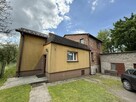 udział 1/2 w dwóch domach i garażu - 1