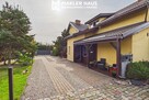 Dom z potencjałem inwestycyjnym – 194 m², pokoje na wynajem, 2 garaże - 1