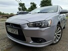 Mitsubishi Lancer Klimatronic, Podgrzewane fotele, Hak holowniczy, Czujniki parkowania - 2