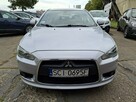 Mitsubishi Lancer Klimatronic, Podgrzewane fotele, Hak holowniczy, Czujniki parkowania - 3