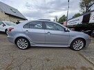 Mitsubishi Lancer Klimatronic, Podgrzewane fotele, Hak holowniczy, Czujniki parkowania - 6