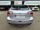 Mitsubishi Lancer Klimatronic, Podgrzewane fotele, Hak holowniczy, Czujniki parkowania - 10