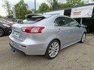 Mitsubishi Lancer Klimatronic, Podgrzewane fotele, Hak holowniczy, Czujniki parkowania - 11