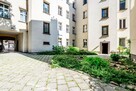 Urocza kawalerka parter Wilda - 12