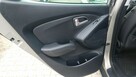 Hyundai ix35 2.0 163ps Benzyna Klimatronic Alusy 17 2xPDC Polskory 4x4 Automat - 12