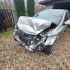 Opel Astra III uszkodzony - 13