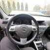 Opel Astra III uszkodzony - 14
