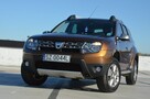 Dacia Duster 1.6i 105 KM Klima/ Navi/ Alu/ Ele. szyby/ Relingi/ Krajowy - 2