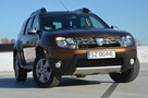 Dacia Duster 1.6i 105 KM Klima/ Navi/ Alu/ Ele. szyby/ Relingi/ Krajowy - 3