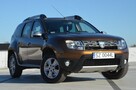 Dacia Duster 1.6i 105 KM Klima/ Navi/ Alu/ Ele. szyby/ Relingi/ Krajowy - 5