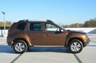 Dacia Duster 1.6i 105 KM Klima/ Navi/ Alu/ Ele. szyby/ Relingi/ Krajowy - 11