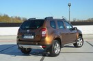 Dacia Duster 1.6i 105 KM Klima/ Navi/ Alu/ Ele. szyby/ Relingi/ Krajowy - 13