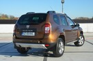 Dacia Duster 1.6i 105 KM Klima/ Navi/ Alu/ Ele. szyby/ Relingi/ Krajowy - 14