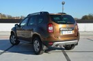 Dacia Duster 1.6i 105 KM Klima/ Navi/ Alu/ Ele. szyby/ Relingi/ Krajowy - 15