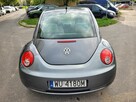 Volkswagen New Beetle 1.4 2006 · 201 400 km · 1 390 cm3 · - 5
