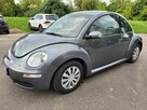 Volkswagen New Beetle 1.4 2006 · 201 400 km · 1 390 cm3 · - 1