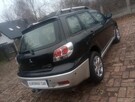 MITSUBISHI OUTLANDER napęd 4+4 - 4