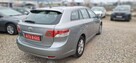 Toyota Avensis Climatronic  navi camera cofania - 6