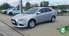 Mitsubishi Lancer Niski przebieg!Serwis w ASO/Czujniki park./Podgrzewane fotele/Alufelgi - 1