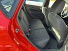 Ford Fiesta 5 drzwi, podgrzewane fotele i szyba czołowa, isofix, niski przebieg - 12