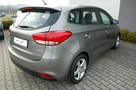 Kia Carens - 4